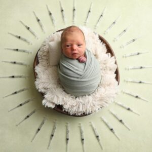 Newborn baby swaddled