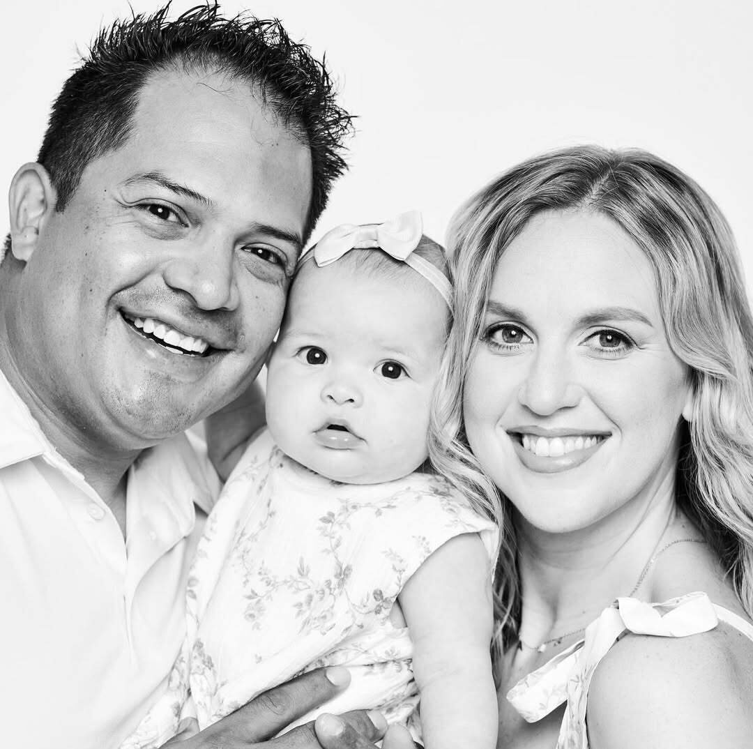 Kristen & Tomas with their daughter